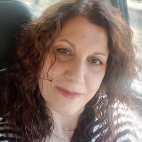 Dina, Babysitter a Aci Sant'antonio