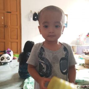 Nora, Keluarga di Tanjong Malim
